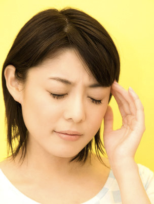 頭痛の女性